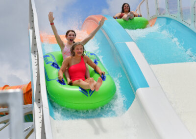 The Edge Watercoaster riders in tubes dropping in for website gallery